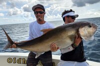 Chad Raney and his mate lift a huge amberjack caught wreck fishing south Florida