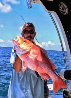 red snapper being weighed by Kevin Adney