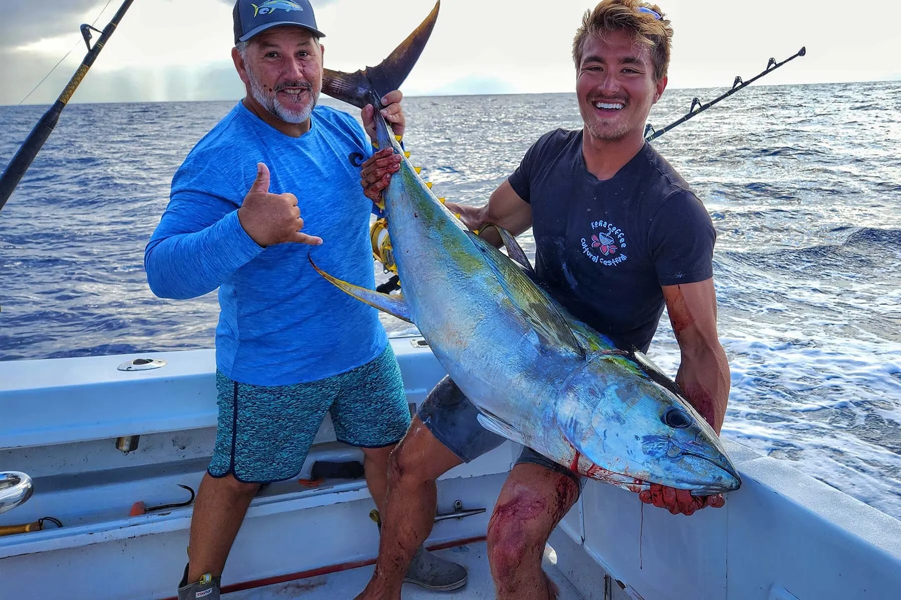 Shawn Rotella and Arthur Bjontegard with a yellowfin tuna caught off of Kona