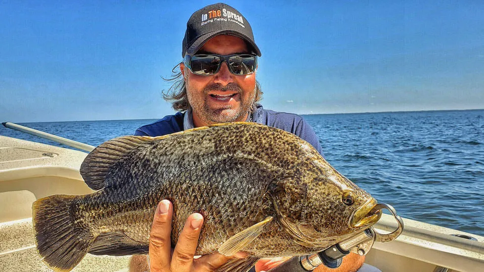 Capt. William Toney catches tripletail caught on FAD's of his own making