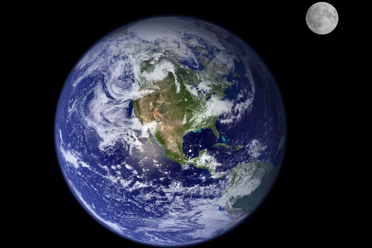 moon in orbit around earth causing ocean tidal movements