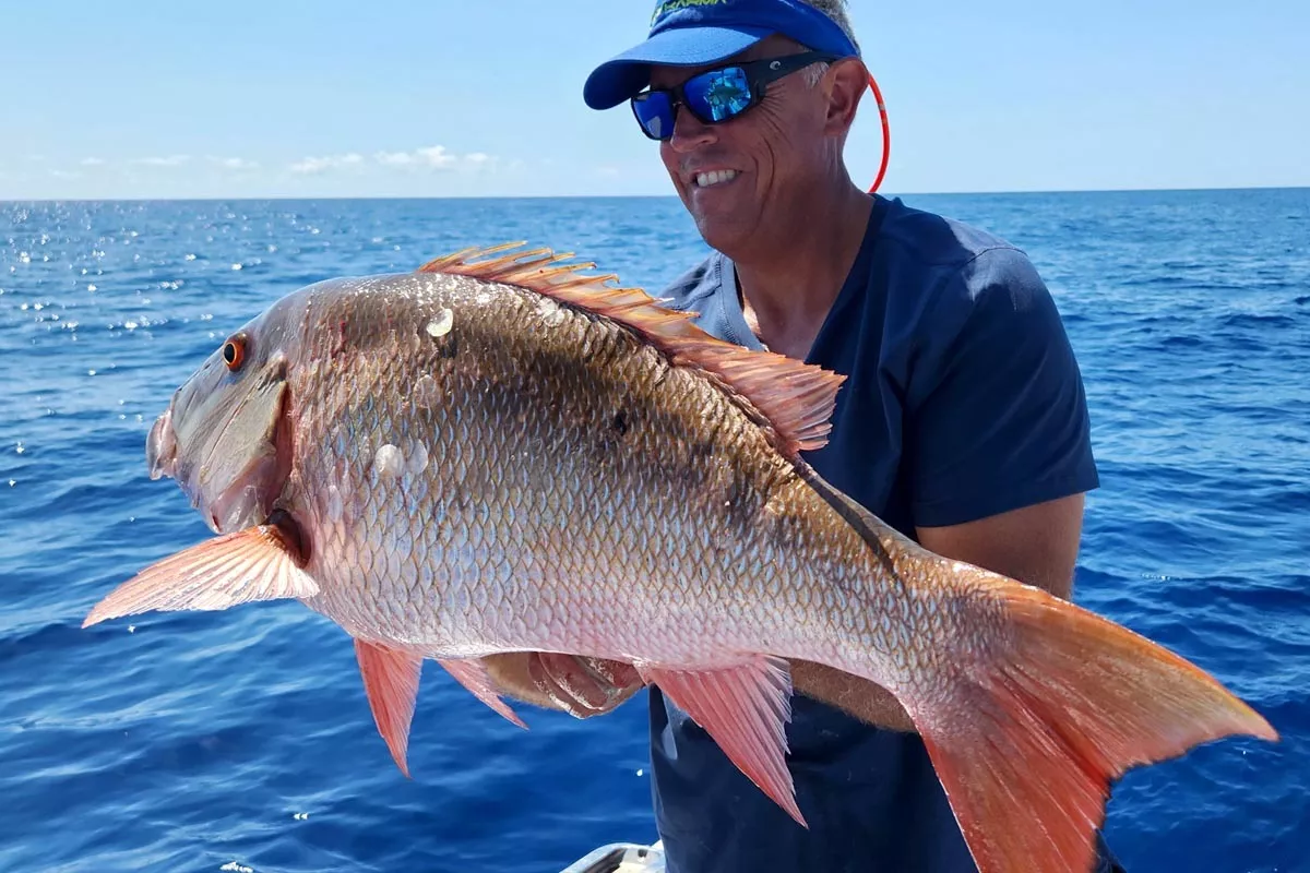 Capt. Ryan Van Fleet with a fat mutton snapper
