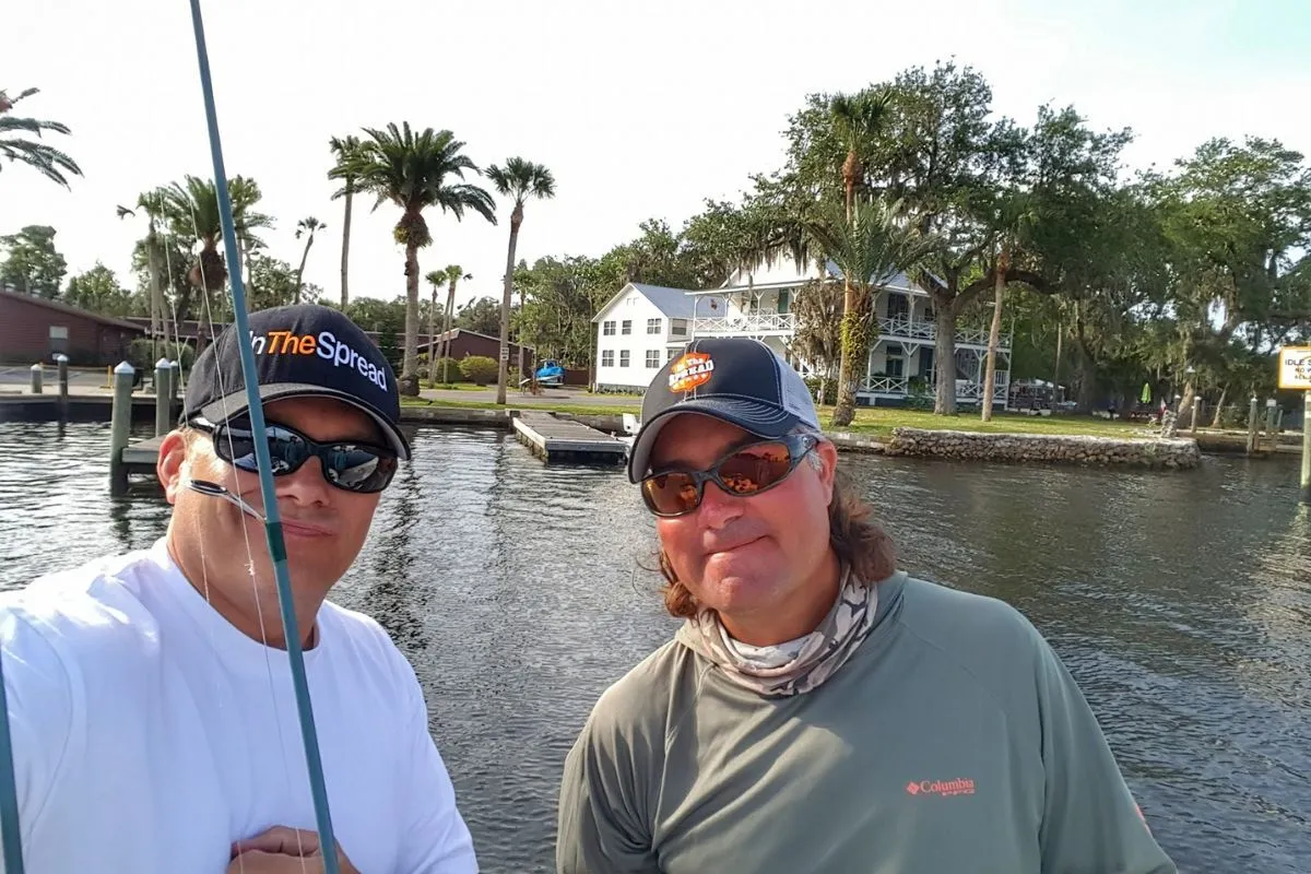 Seth Horne and William Toney in front of the McRae house on the homosassa river