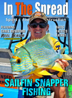 Sailfin Snapper held by fisherman with In The Spread hat