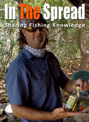 Capt William Toney showing cooking techniques for redfish and snapper