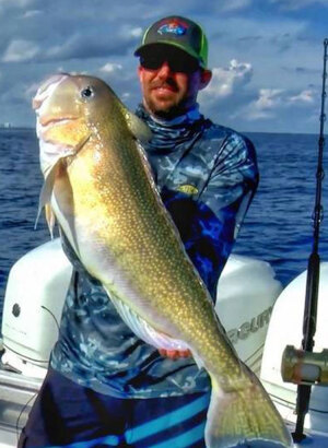 Mike Dumas aka Mutton Mike catches a golden tilefish off Miami