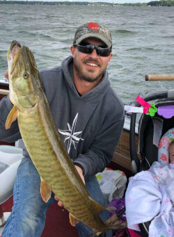 Corey Allen with a trophy fall muskie caught on the Clinch River