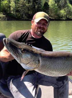 Cory Allen with one of his many giant muskie