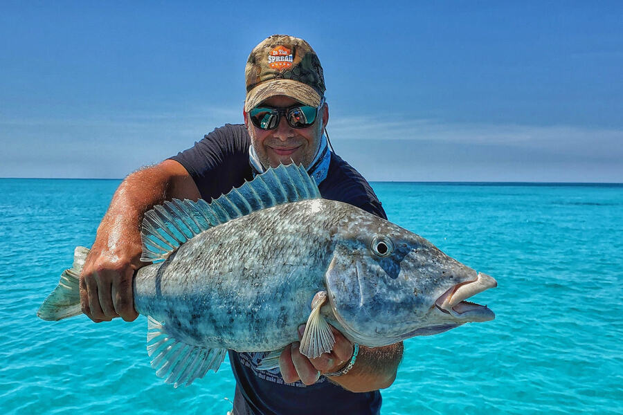 Seth Horne at Rowley Shoals with a long nose emperor fish