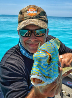 Seth Horne at Rowley Shoals with a long nose emperor fish