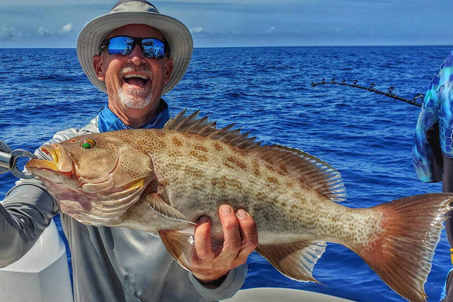 kevin adney with a Florida gag grouper caught bottom fishing