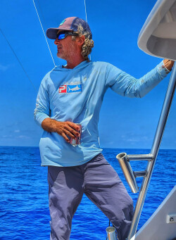Kevin Hibbard scans the horizon for signs of blue marlin