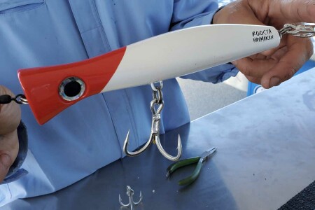 Halco popper rigged with heavy gauge treble hooks for GT fishing