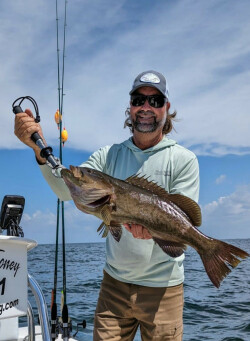 Capt. William Toney with a fat Homosassa, Florida gag grouper caught reef fishing