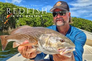 william toney showing redfish caught in hot weather
